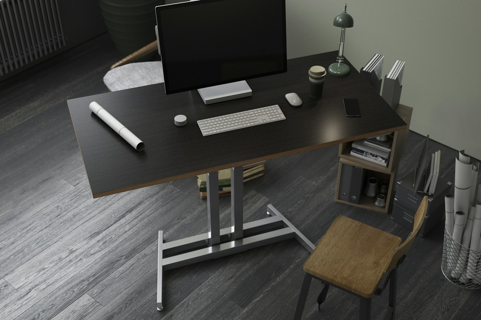 A single iMac on a dark wood desk in a quiet workspace
